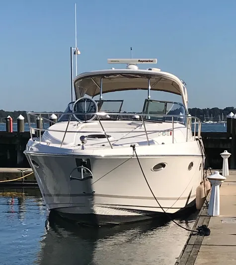  Yacht Photos Pics 2009 Regal Commodore 4060 yacht docked at marina on a sunny day.
