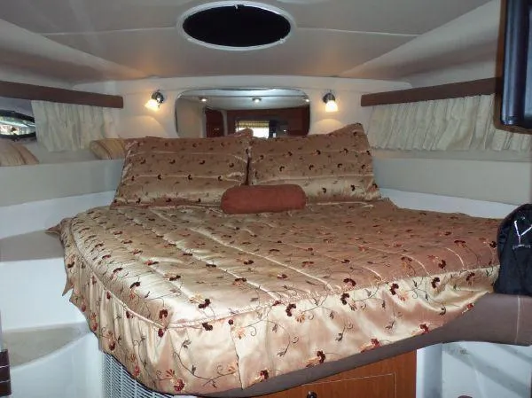  Yacht Photos Pics Luxurious cabin interior of 2009 Regal Commodore 4060 yacht with elegant bedding.