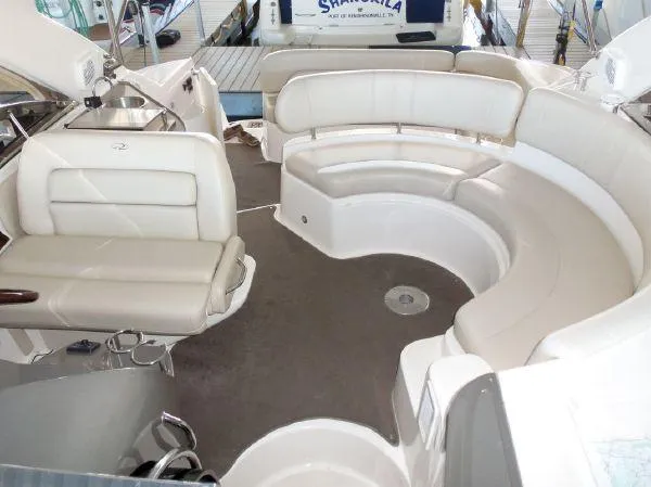  Yacht Photos Pics 2009 Regal Commodore 4060 yacht interior with white leather seating.