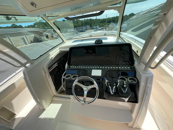  Yacht Photos Pics 2025 Grady-White Canyon 386 helm with advanced controls and navigation system.
