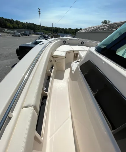  Yacht Photos Pics 2025 Grady-White Canyon 386 boat deck, sleek design, spacious seating, outdoor setting.