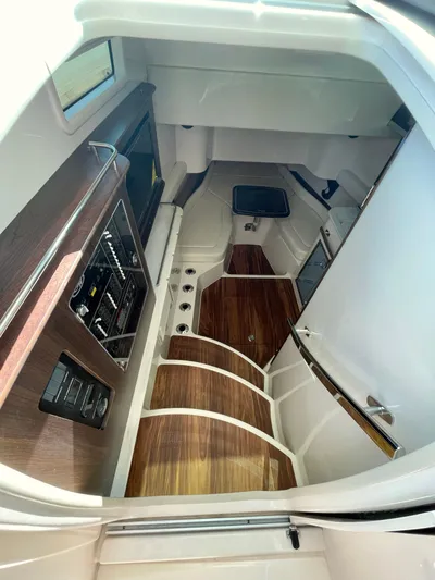 Yacht Photos Pics Interior of 2025 Grady-White Canyon 386 boat, featuring sleek wood flooring and modern design.