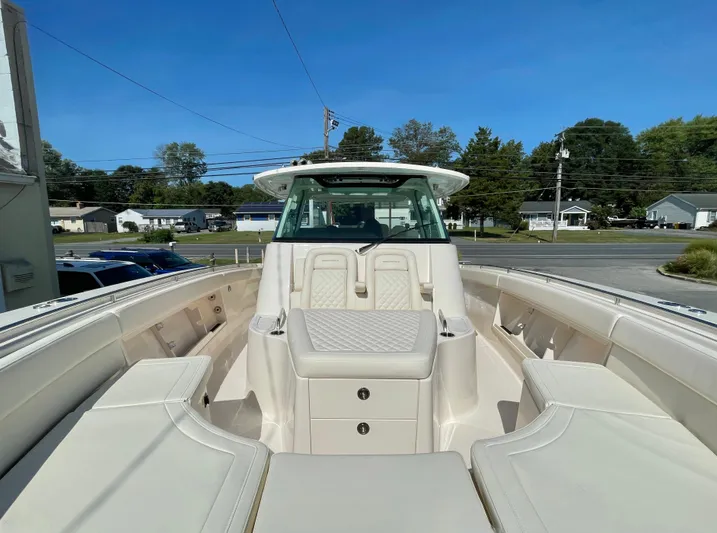  Yacht Photos Pics 2025 Grady-White Canyon 386 boat with spacious seating and sleek design.