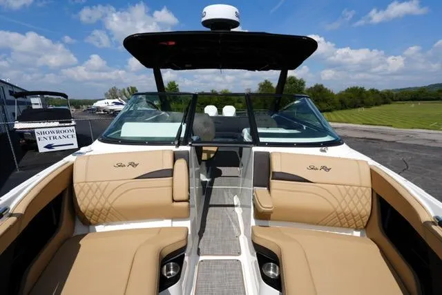  Yacht Photos Pics 2024 Sea Ray 280 SLX boat interior with tan seating and sleek design.