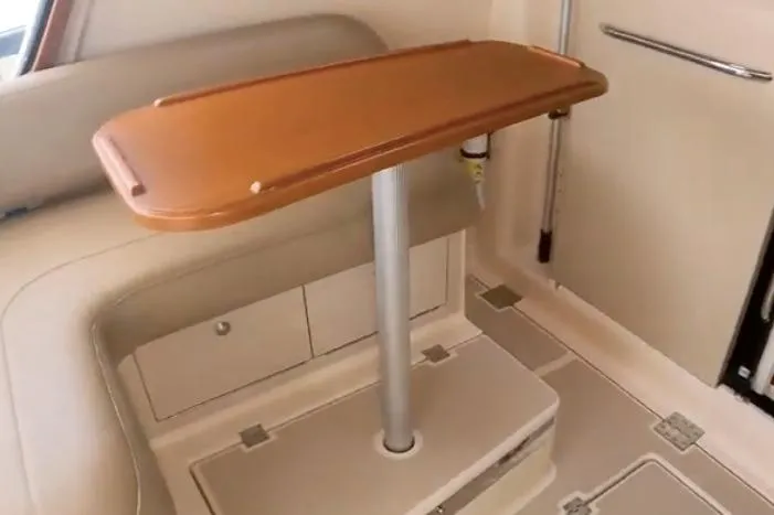 Navigator Yacht Photos Pics 2002 Island Packet Packet Craft Express 360 interior with wooden table and seating area.