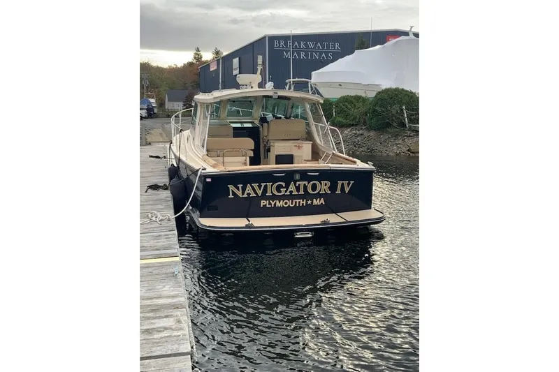 Navigator Yacht Photos Pics 2002 Island Packet Packet Craft Express 360 docked at Breakwater Marinas.