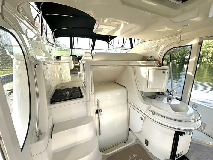  Yacht Photos Pics 2004 Carver 466 Motor Yacht interior with sleek white design and modern amenities.