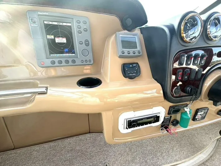  Yacht Photos Pics Dashboard of a 2004 Carver 466 Motor Yacht with navigation and control instruments.