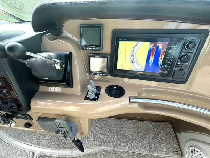  Yacht Photos Pics Control panel of 2004 Carver 466 Motor Yacht with Garmin navigation system.