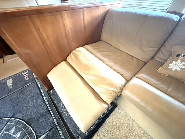  Yacht Photos Pics Beige leather seating in 2004 Carver 466 Motor Yacht interior.