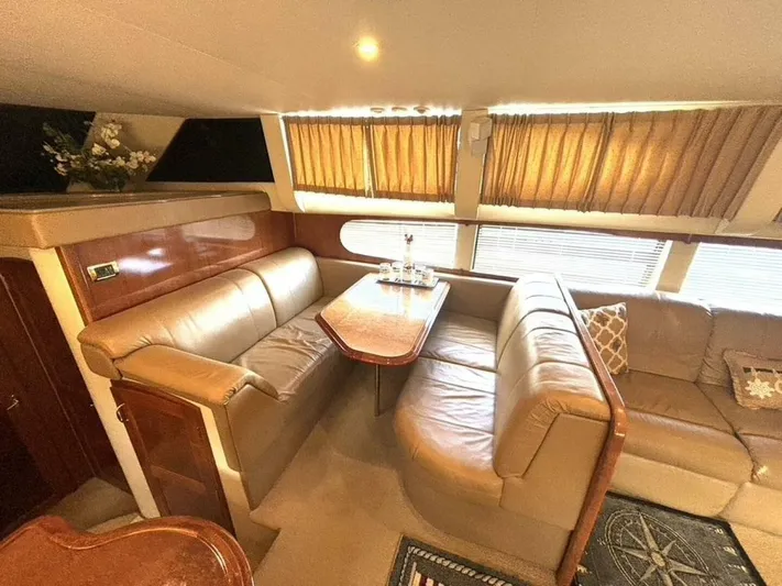  Yacht Photos Pics Luxurious interior of 2004 Carver 466 Motor Yacht with leather seating and elegant decor.