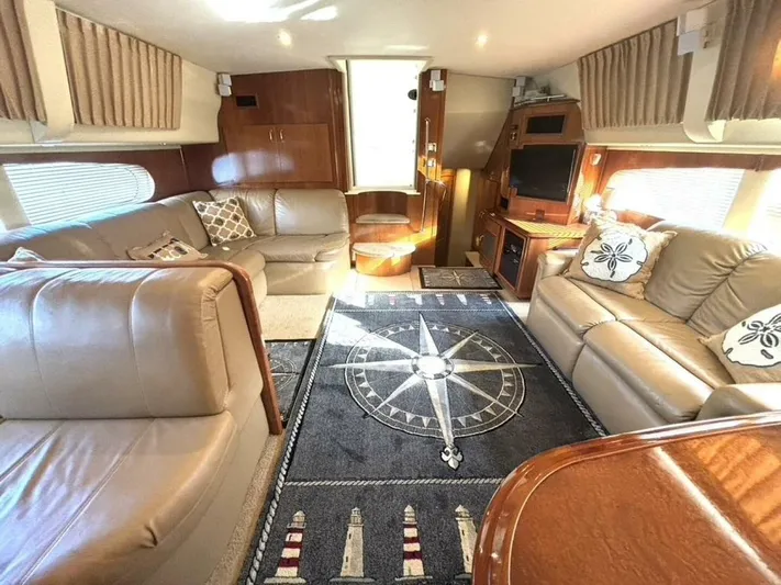  Yacht Photos Pics Luxurious interior of a 2004 Carver 466 Motor Yacht with plush seating and nautical decor.