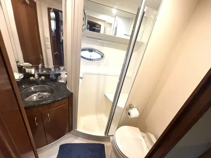  Yacht Photos Pics Luxurious bathroom in 2004 Carver 466 Motor Yacht with shower and vanity.