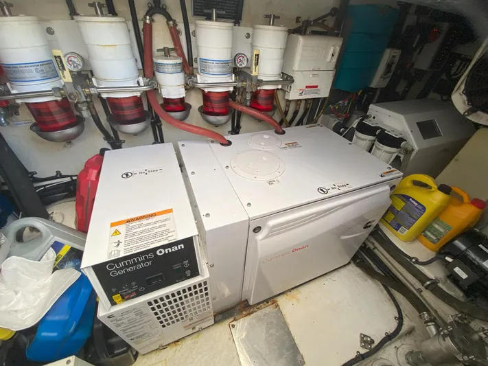  Yacht Photos Pics Engine room of 2016 Riviera 43 Open Flybridge with Cummins Onan generator.