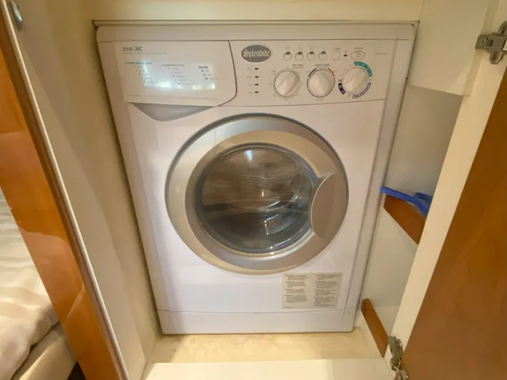  Yacht Photos Pics Washing machine in 2016 Riviera 43 Open Flybridge yacht's interior.
