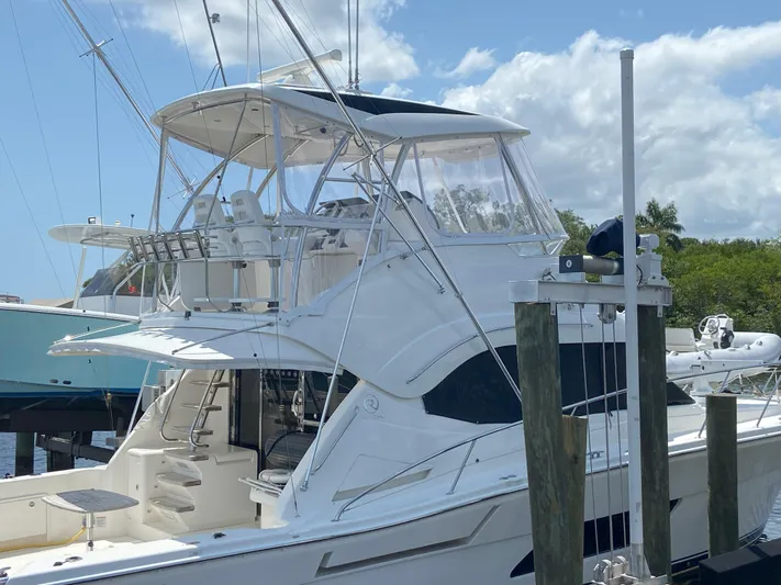  Yacht Photos Pics 2016 Riviera 43 Open Flybridge yacht docked at marina.