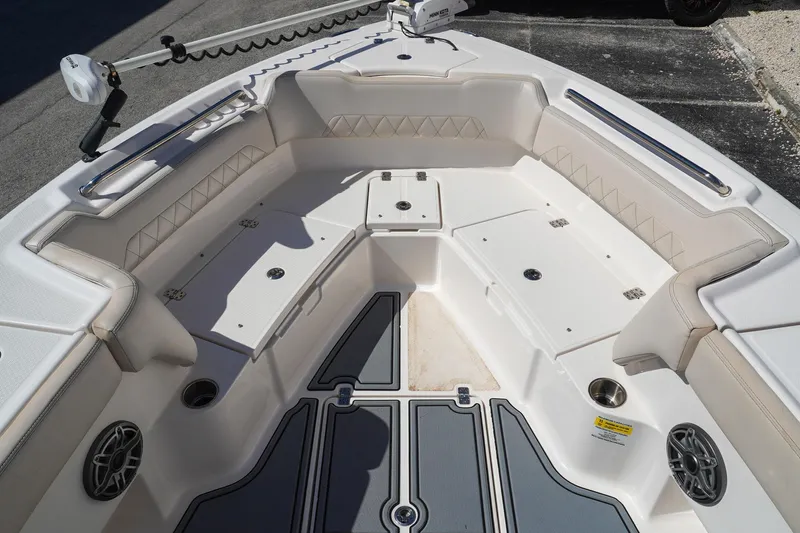  Yacht Photos Pics 2021 Blue Wave Boats Makaira interior with cushioned seating and storage compartments.