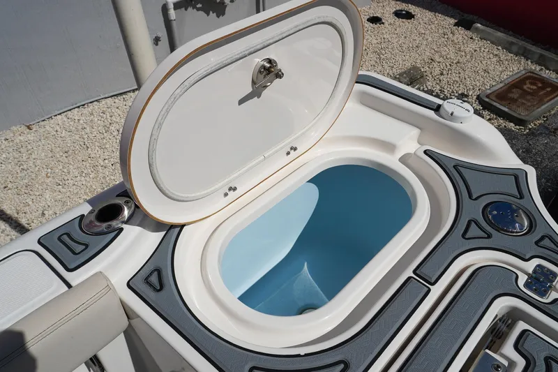  Yacht Photos Pics 2021 Blue Wave Boats Makaira livewell with open lid, showcasing interior design.