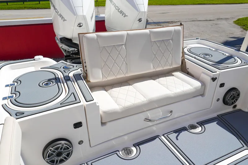  Yacht Photos Pics 2021 Blue Wave Boats Makaira with cushioned seating and dual Mercury engines.