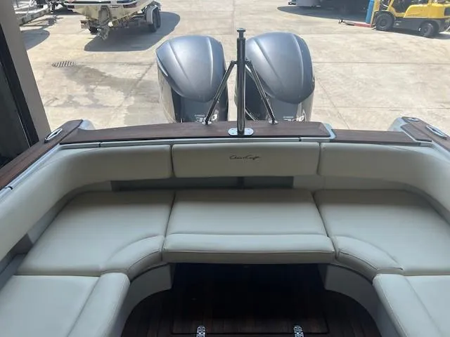  Yacht Photos Pics 2014 Chris-Craft Catalina 29 boat with cushioned seating and dual outboard motors.