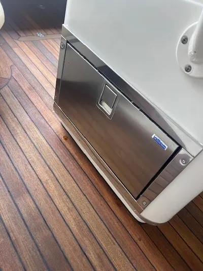  Yacht Photos Pics Stainless steel hatch on 2014 Chris-Craft Catalina 29 boat with wooden deck.