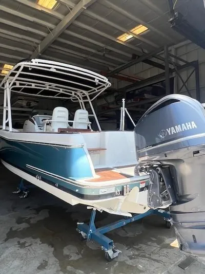  Yacht Photos Pics 2014 Chris-Craft Catalina 29 boat with Yamaha engine in a storage facility.
