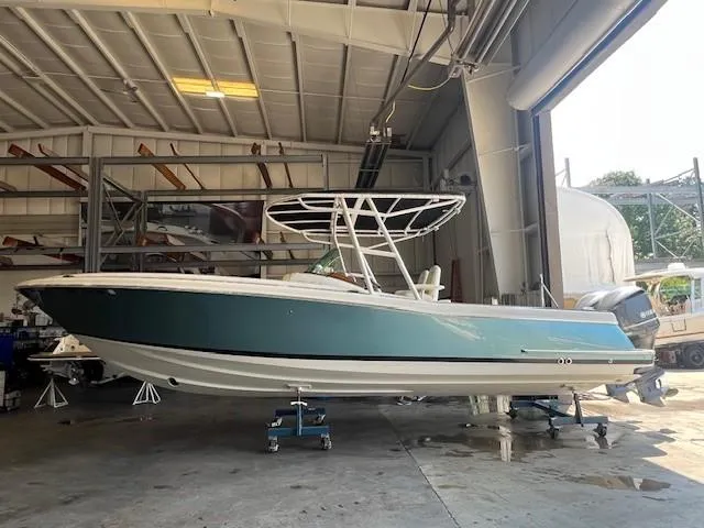  Yacht Photos Pics 2014 Chris-Craft Catalina 29 boat in a storage facility.