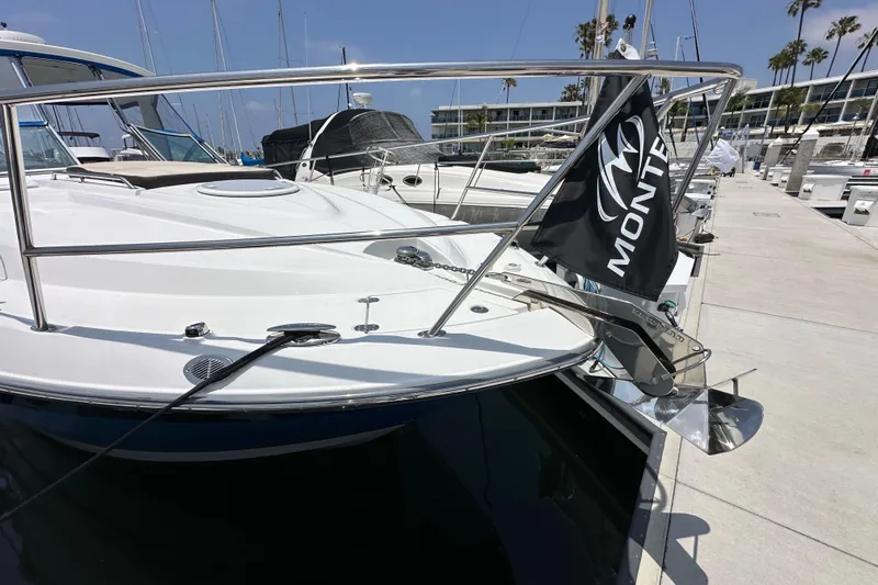 Relentless Yacht Photos Pics 2020 Monterey 355 Sport Yacht docked, showcasing sleek design and modern features.