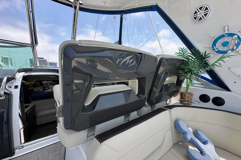 Relentless Yacht Photos Pics Interior of 2020 Monterey 355 Sport Yacht with plush seating and nautical decor.