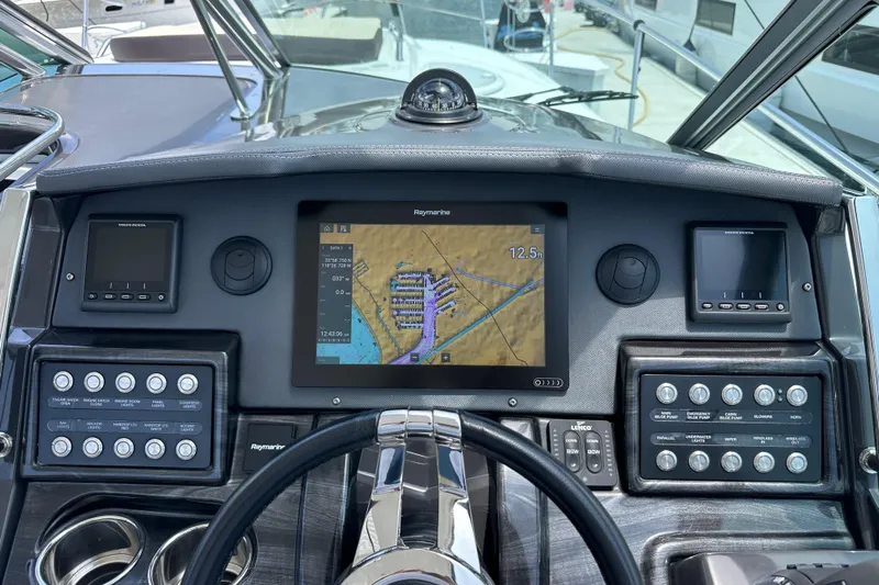 Relentless Yacht Photos Pics Dashboard of 2020 Monterey 355 Sport Yacht with navigation and control panels.