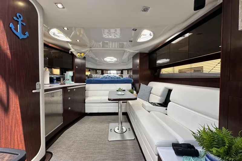 Relentless Yacht Photos Pics Luxurious interior of 2020 Monterey 355 Sport Yacht with modern furnishings and decor.