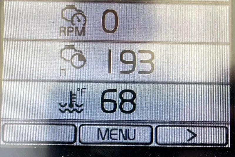 Relentless Yacht Photos Pics Digital display showing RPM, engine hours, and temperature for 2020 Monterey 355 Sport Yacht.