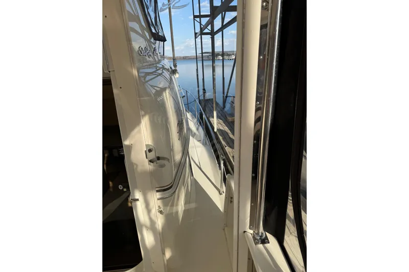  Yacht Photos Pics 1997 Sea Ray 370 Aft Cabin yacht docked, showcasing sleek exterior design.