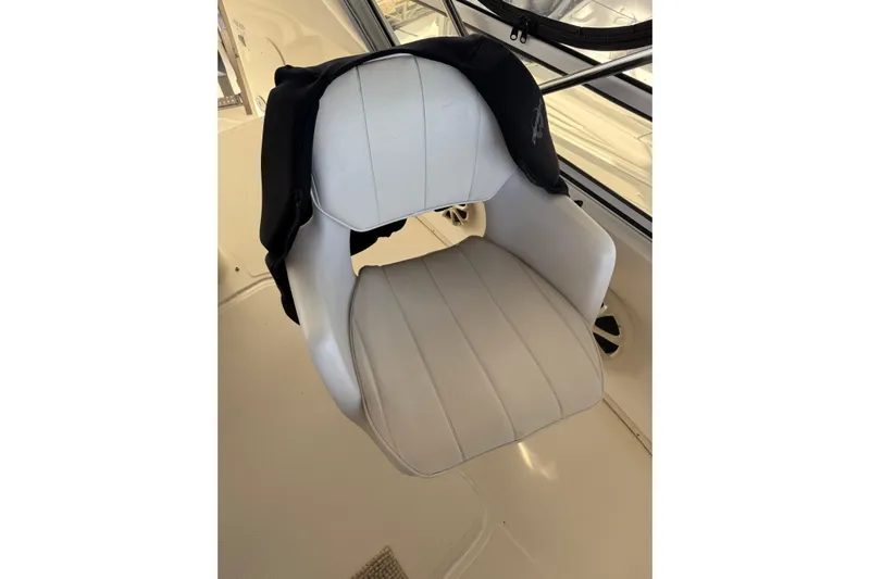  Yacht Photos Pics White captain's chair on 1997 Sea Ray 370 Aft Cabin boat.