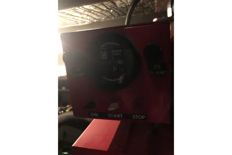  Yacht Photos Pics Control panel of a 1997 Sea Ray 370 Aft Cabin boat, featuring engine hour meter.