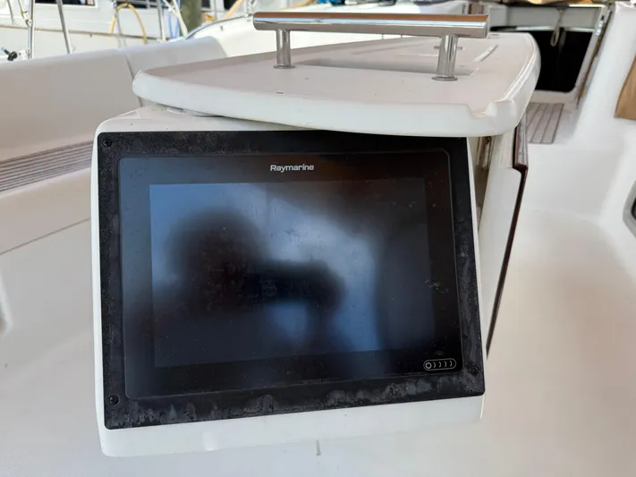 Passion Place Yacht Photos Pics Raymarine navigation display on 2007 Beneteau 49 yacht cockpit.