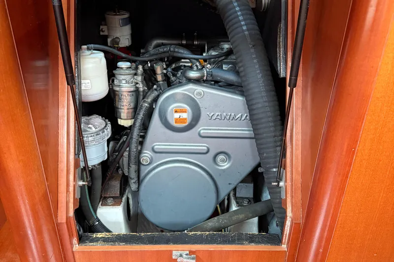 Passion Place Yacht Photos Pics Engine compartment of a 2007 Beneteau 49 sailboat with Yanmar engine.