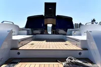 2023 Custom Limo Tender yacht with open deck and sleek design.