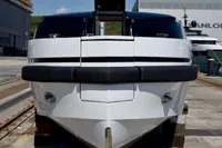 Custom 2023 Limo Tender yacht in shipyard, front view, sleek design.