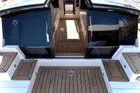 Custom 2023 Limo Tender with sleek wooden deck and modern design.