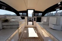 Luxurious interior of 2023 Custom Limo Tender yacht with plush seating and sleek design.