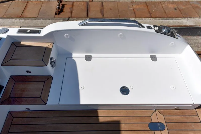 Wb 7.5m Custom Limo Tender Yacht Photos Pics Custom 2023 Limo Tender boat deck with sleek white and wood design.