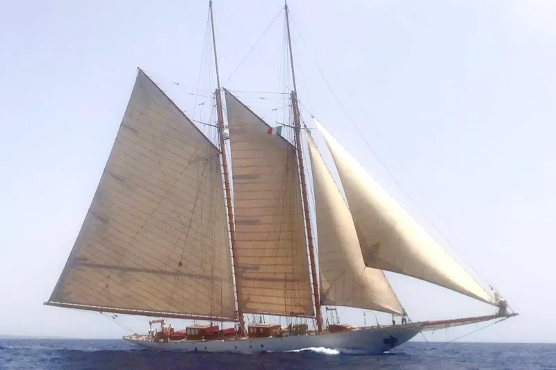 Invader Yacht Photos Pics Historic 1905 Gaff Schooner by G. LAWLEY & Son Corporation sailing on open sea.