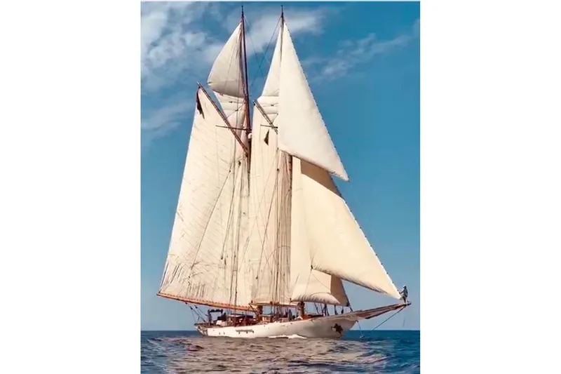 Invader Yacht Photos Pics Historic 1905 Gaff Schooner by G. LAWLEY & Son Corporation sailing under clear skies.