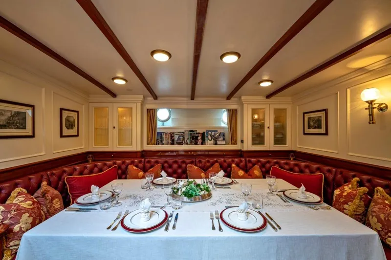 Invader Yacht Photos Pics Luxurious dining area on 1905 Gaff Schooner by G. LAWLEY & Son Corporation, USA.