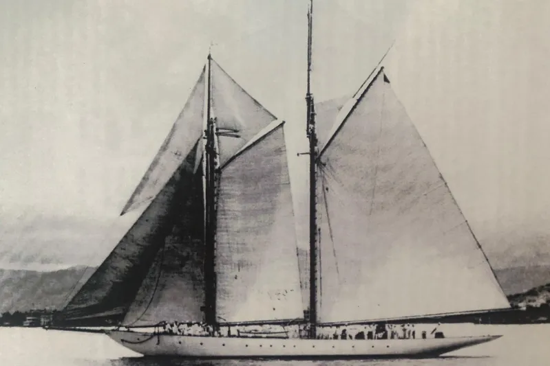 Invader Yacht Photos Pics Vintage 1905 Gaff Schooner by G. LAWLEY & Son Corporation, USA, sailing on calm waters.