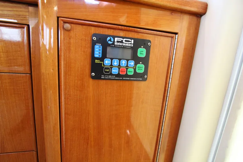  Yacht Photos Pics Control panel on 2005 Riviera 46 Convertible Sportfisher, featuring FCI Watermakers system.