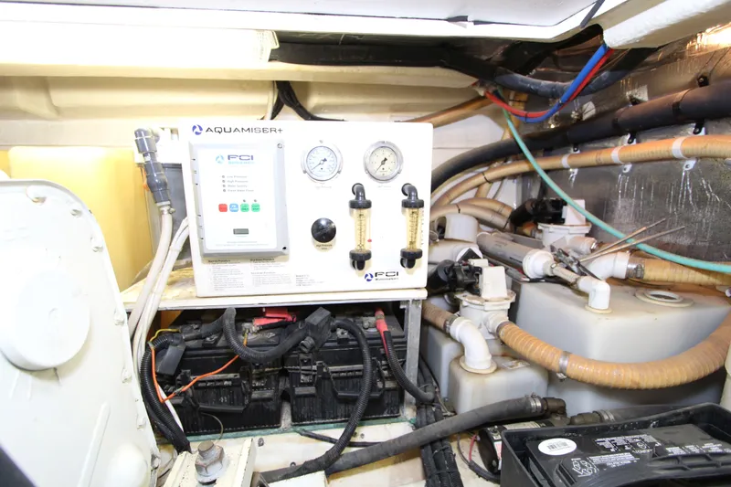  Yacht Photos Pics Engine room of 2005 Riviera 46 Convertible Sportfisher with Aquamiser+ water system.