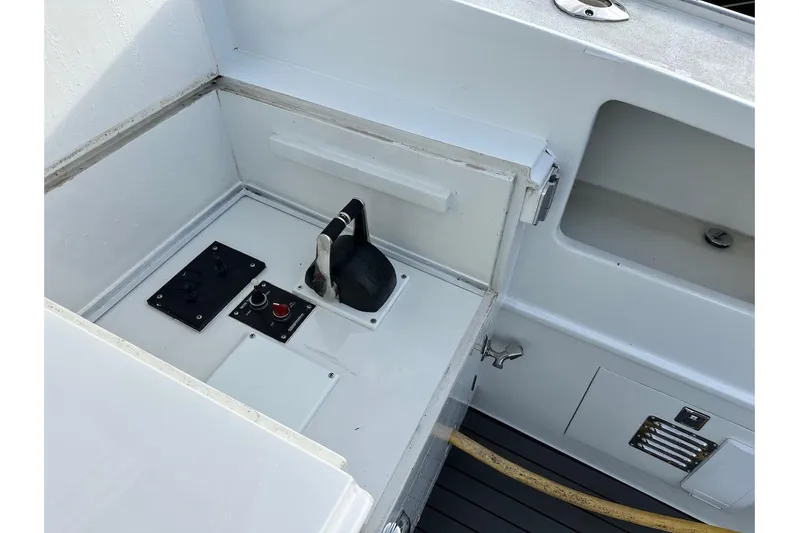 First Home Yacht Photos Pics Control panel on 1988 Cheoy Lee 92 yacht, featuring throttle and switches.