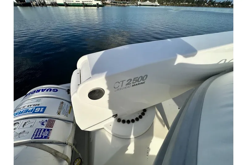 First Home Yacht Photos Pics 1988 Cheoy Lee 92 yacht with Steelhead Marine CT2500 crane on deck.